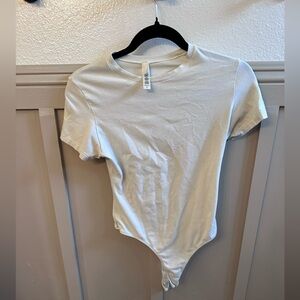 Skims stretch cotton jersey t-shirt bodysuit size m BONE